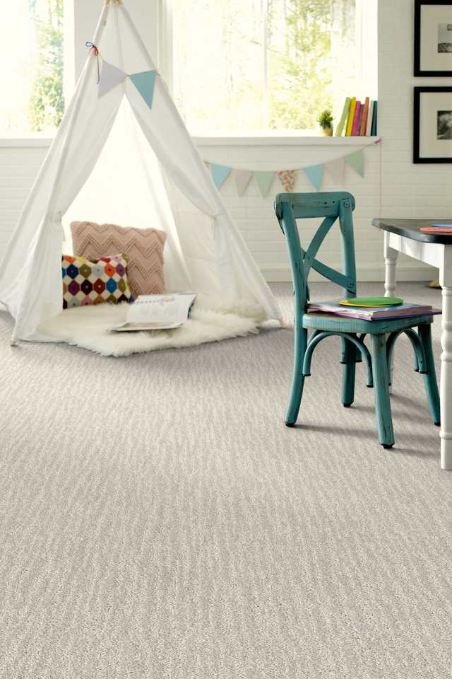 gray patterned carpet in kids room with white popup tent
